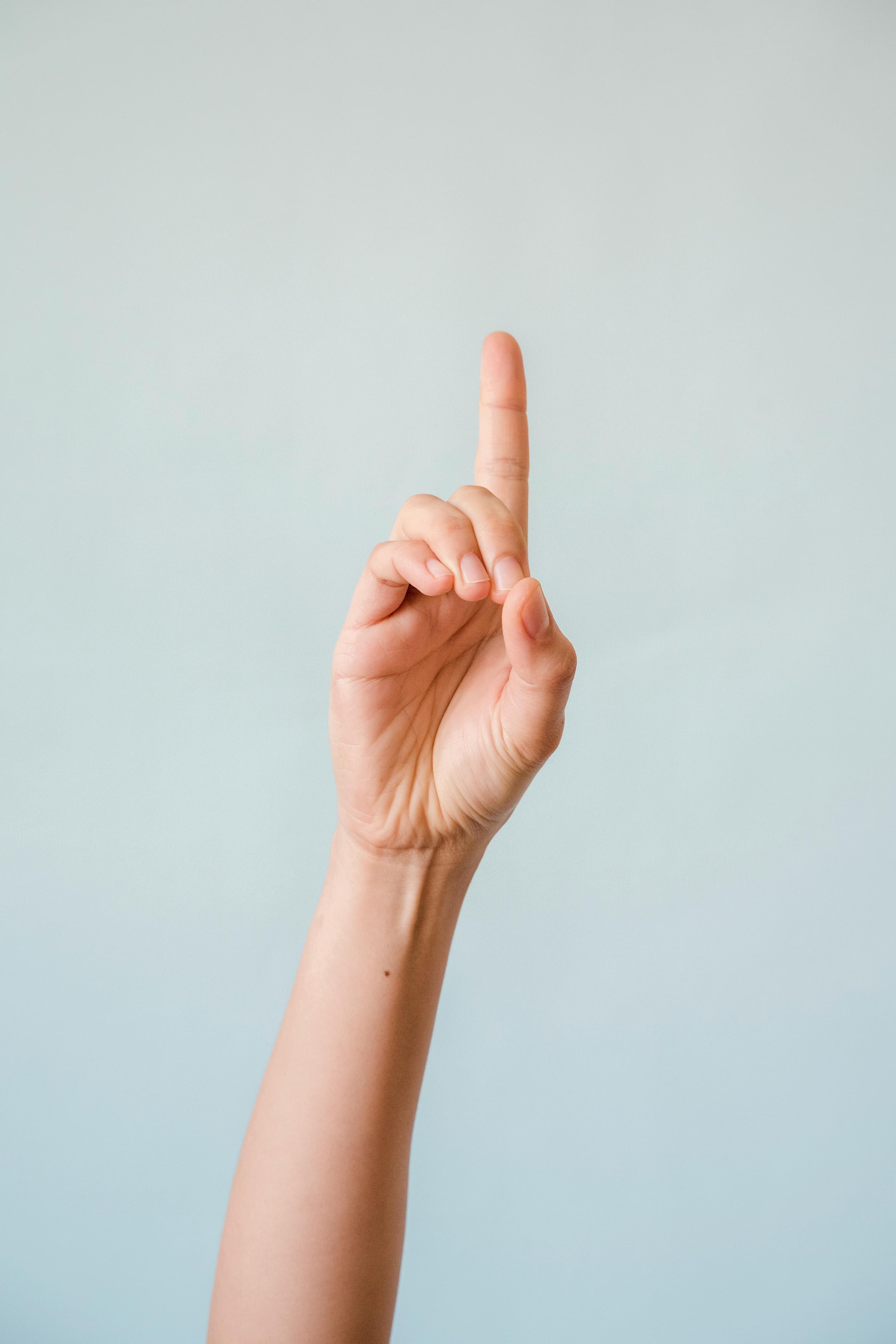 Hand displaying one finger.